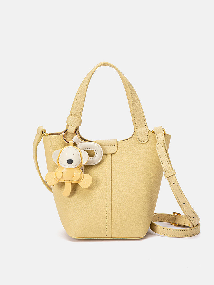 PAZZION, Haley Leather Charmed Bucket Bag, Yellow