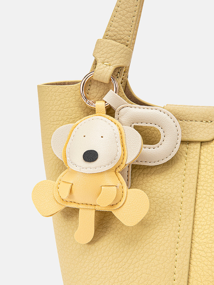 PAZZION, Haley Leather Charmed Bucket Bag, Yellow