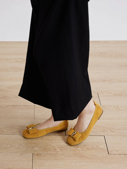 PAZZION, Keyla Gold Accented Bow Suede Flats, Yellow